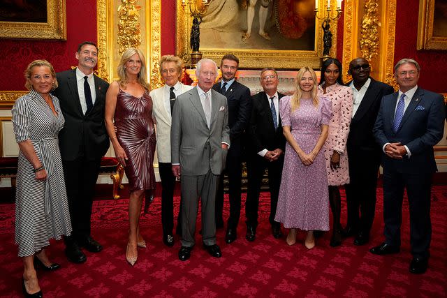 <p>KIRSTY WIGGLESWORTH/POOL/AFP via Getty</p> King Charles (center) poses with (from third left) Penny Lancaster, Rod Stewart, David Beckham, Sienna Miller (fourth right), Naomi Campbell and Edward Enninful at The King's Foundation Awards on June 11, 2024.