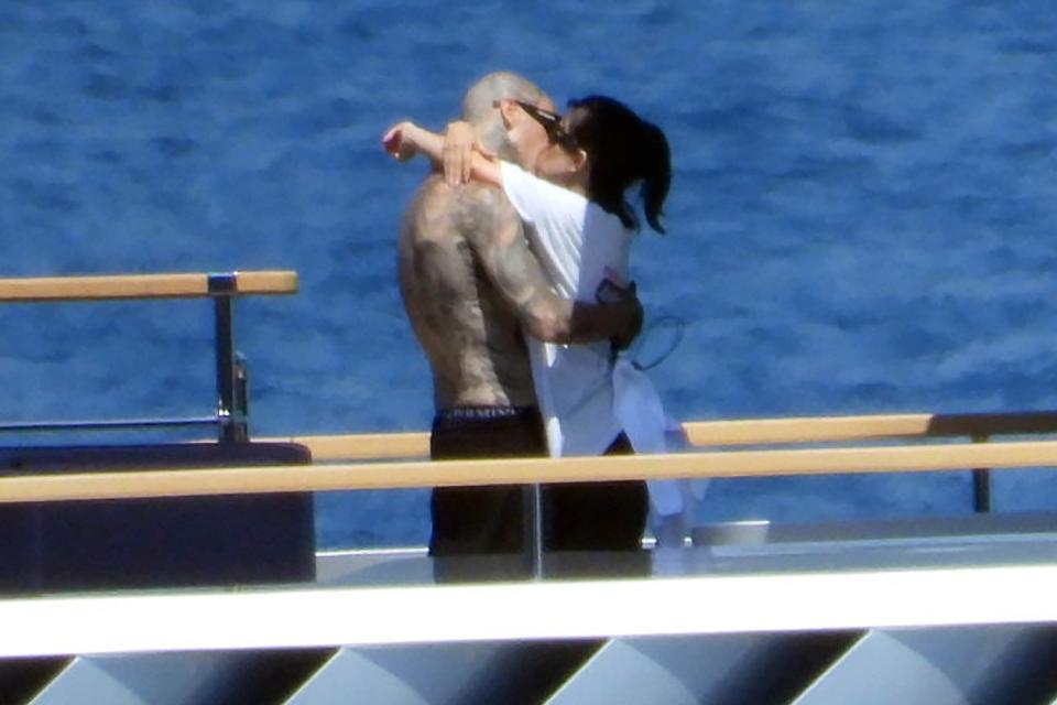 PREMIUM EXCLUSIVE: Kourtney Kardashian and Travis Barker kissing on a boat in Portofino. 20 May 2022 Pictured: Kourtney Kardashian, Travis Barker. Photo credit: MEGA TheMegaAgency.com +1 888 505 6342