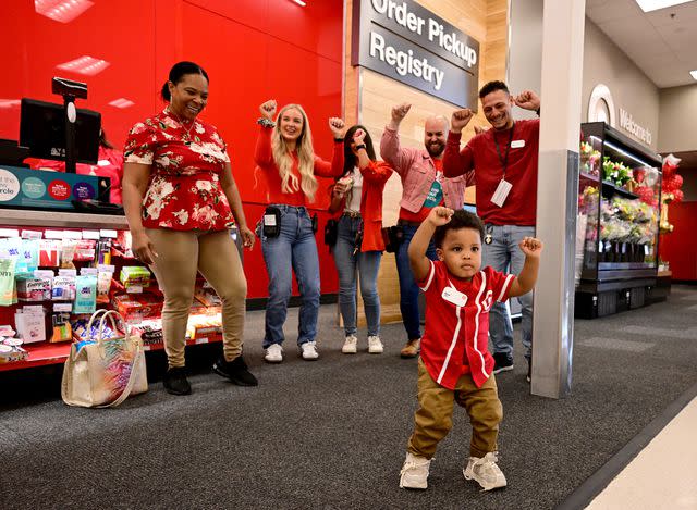 <p>Grant Halverson/Getty Images for Target</p> Azai adorably prepares to greet Target guests