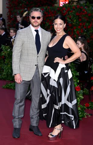 <p>Gareth Cattermole/Getty</p> James McAvoy and Lisa Liberati