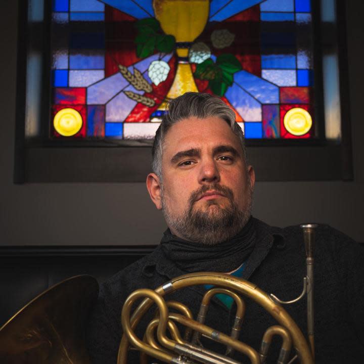 Marc Zyla is the principal horn player for the Quad City Symphony Orchestra.
