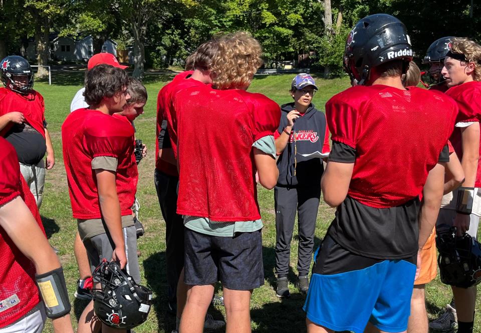 Bear Lake coach coach Sam Mullet directs her football team during practice last month.