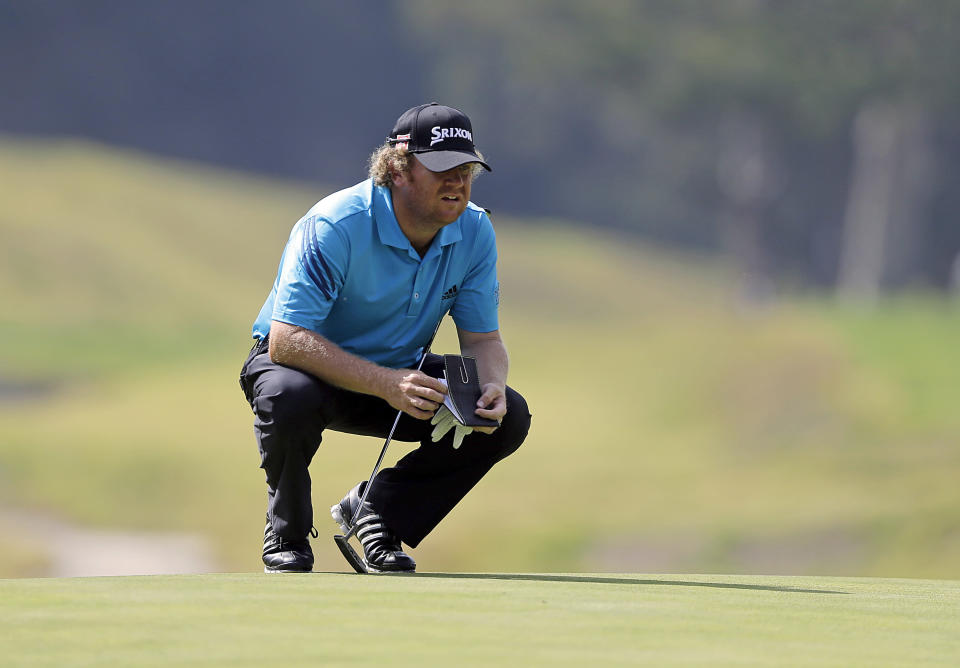 William McGirt looks over the eighth green during the third round of the Northern Trust Open golf tournament at Riviera Country Club in the Pacific Palisades area of Los Angeles Saturday, Feb. 15, 2014. (AP Photo/Reed Saxon)