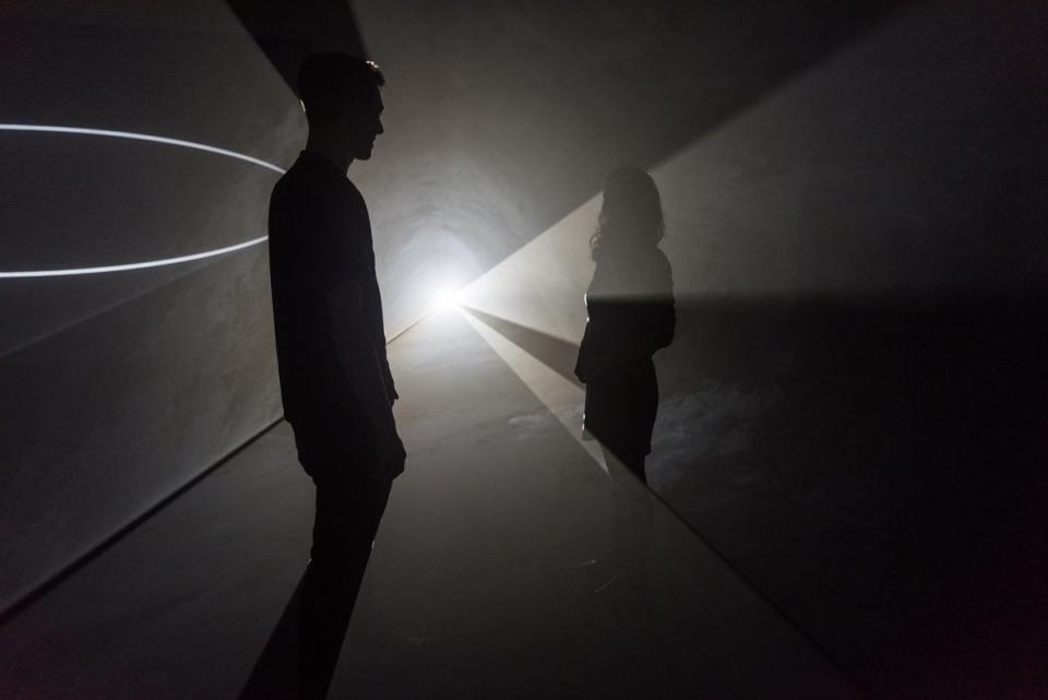 Visitors watch Face to Face, 2013 by Anthony McCall, The Hepworth Wakefield (Darren O'Brien/Guzelian)