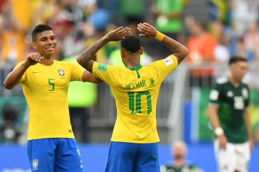 Casemiro celebrating with Neymar at the end of Brazil's 2-0 win over Mexico -- but the Real Madrid man will be banned for the quarter-final against Belgium