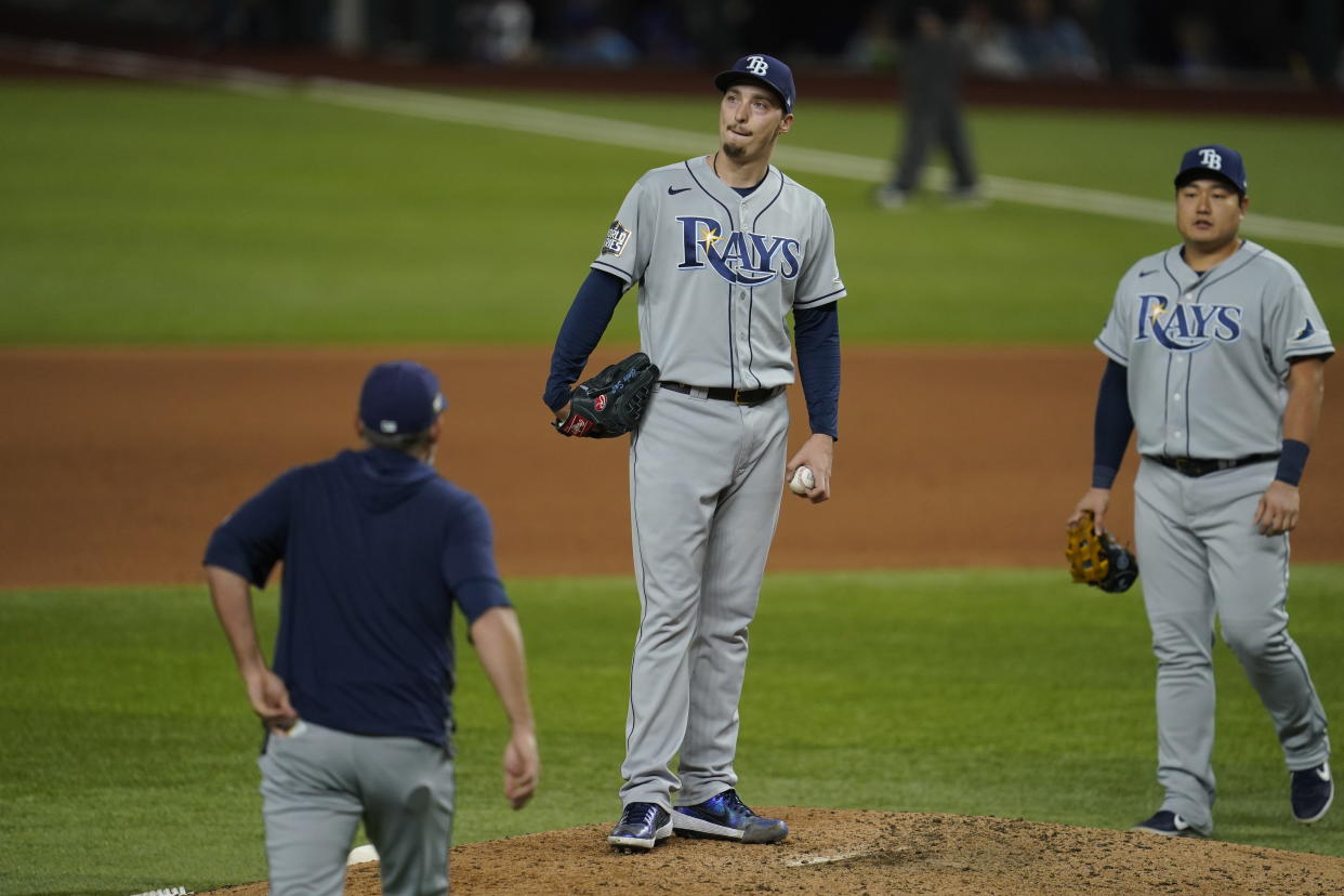 Blake Snell of the Tampa Bay Rays reacts after giving up a hit in the sixth inning of Game 6.