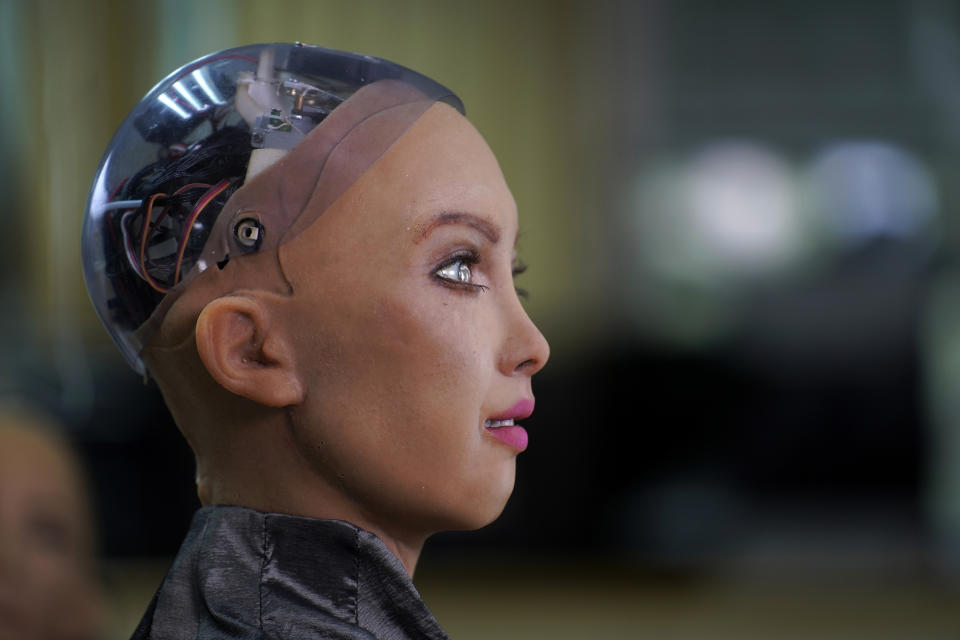 The head of Sophia is seen at Hanson Robotics studio in Hong Kong on March 29, 2021. Sophia is a robot of many talents — she speaks, jokes, sings and even makes art. In March, she caused a stir in the art world when a digital work she created as part of a collaboration was sold at an auction for $688,888 in the form of a non-fungible token (NFT). (AP Photo/Vincent Yu)