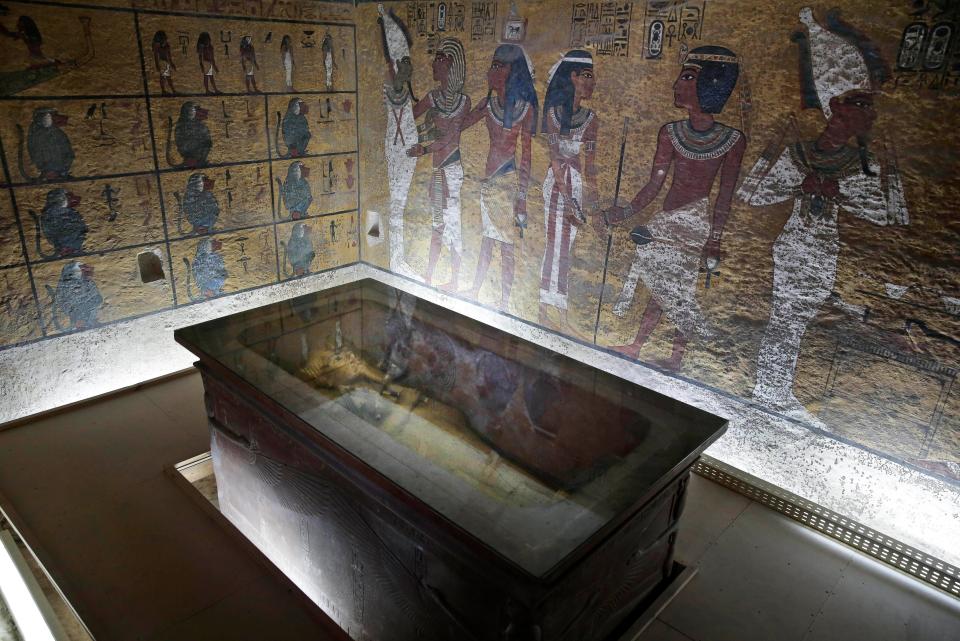 In this 2015 file photo, the tomb of King Tut is displayed in a glass case at the Valley of the Kings in Luxor, Egypt.