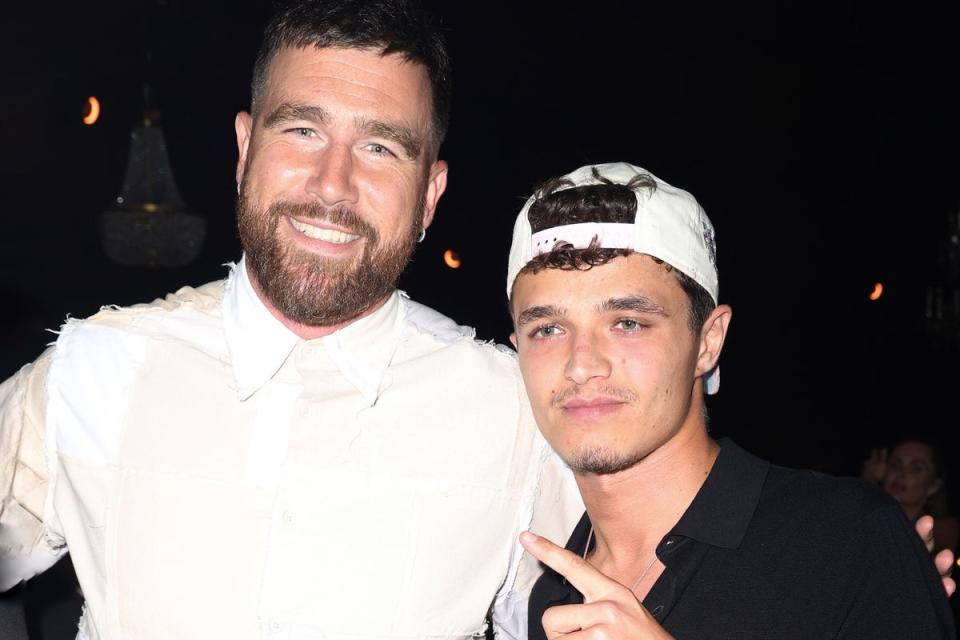 Lando Norris (right) partied with Travis Kelce (left) at Carbone Beach in Miami last week (Getty)