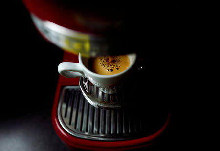 FILE PHOTO: An illustration picture shows an espresso made from a Nespresso capsule with a kitchen-aid coffee maker, May 1, 2017. REUTERS/Kai Pfaffenbach/Illustration/File Photo