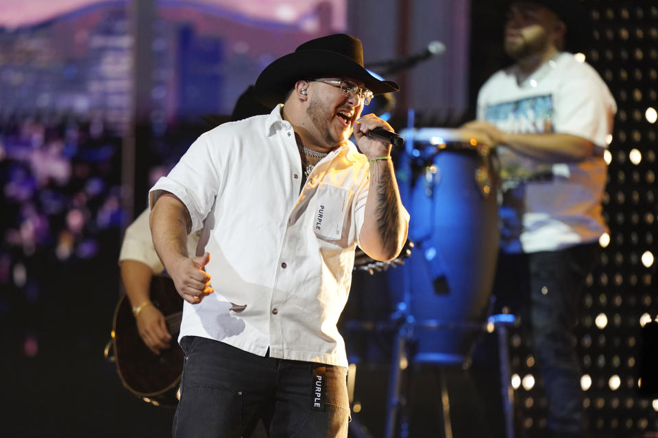 FILE - Grupo Frontera performs during the Latin Billboard Awards, Thursday, Oct. 5, 2023, in Coral Gables, Fla. The group's sophomore album “Jugando Que No Pasa Nada" releases on Friday. (AP Photo/Marta Lavandier, File)