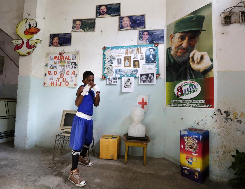 Fifth grade student at the Enrique Villuendas Primary School, Erisdanis Moiran, poses in his boxer costume