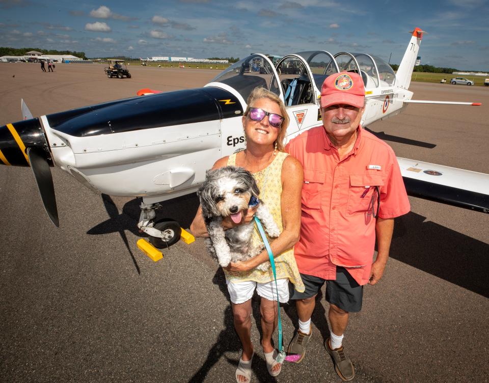 Wayne and Melody Mauro and their dog, Matilda, flew into Sun 'n Fun on Monday in their 1986 Socata Epsilon French military trainer.