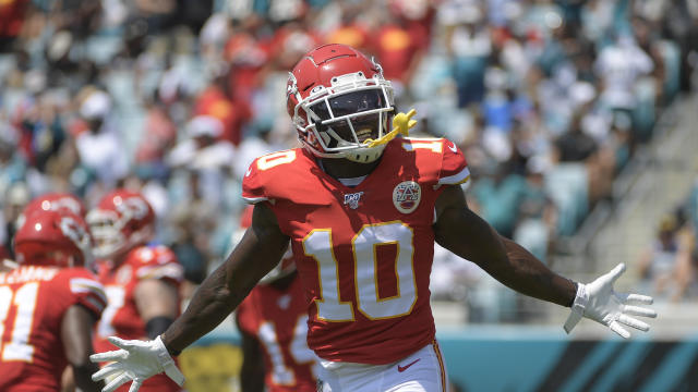 Kansas City Chiefs wide receiver Sammy Watkins (14) tries to break