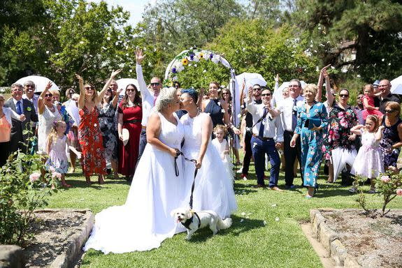 Newlyweds Amy Laker and Lauren Price tie the knot.