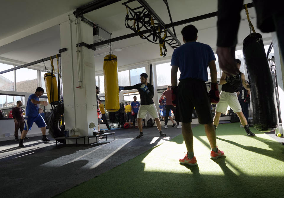 Members of the Afghan national boxing team attend a training session in local gym in Serbia, Wednesday, Dec. 1, 2021. They practiced in secrecy and sneaked out of Afghanistan to be able to compete at an international championship. Now, the Afghan boxing team are seeking refuge in the West to be able to continue both their careers and lives without danger or fear. (AP Photo/Darko Vojinovic)