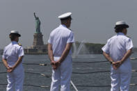 <p>Crew members of Her Majesty Canadian Ship Athabaskan man the rails as they sail past the Statue of Liberty, Wednesday, May 25, 2016, in New York. The annual Fleet Week is bringing a flotilla of activities, including a parade of ships sailing up the Hudson River and docking around the city. The events continue through Memorial Day. (AP Photo/Mary Altaffer) </p>