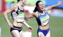 <p>Abbey D’Agostino of USA sustains an injury next to Nikki Hamblin of New Zealand during the women’s 5000m round 1 race at the Olympic Stadium on August 16, 2016. (REUTERS/Phil Noble) </p>