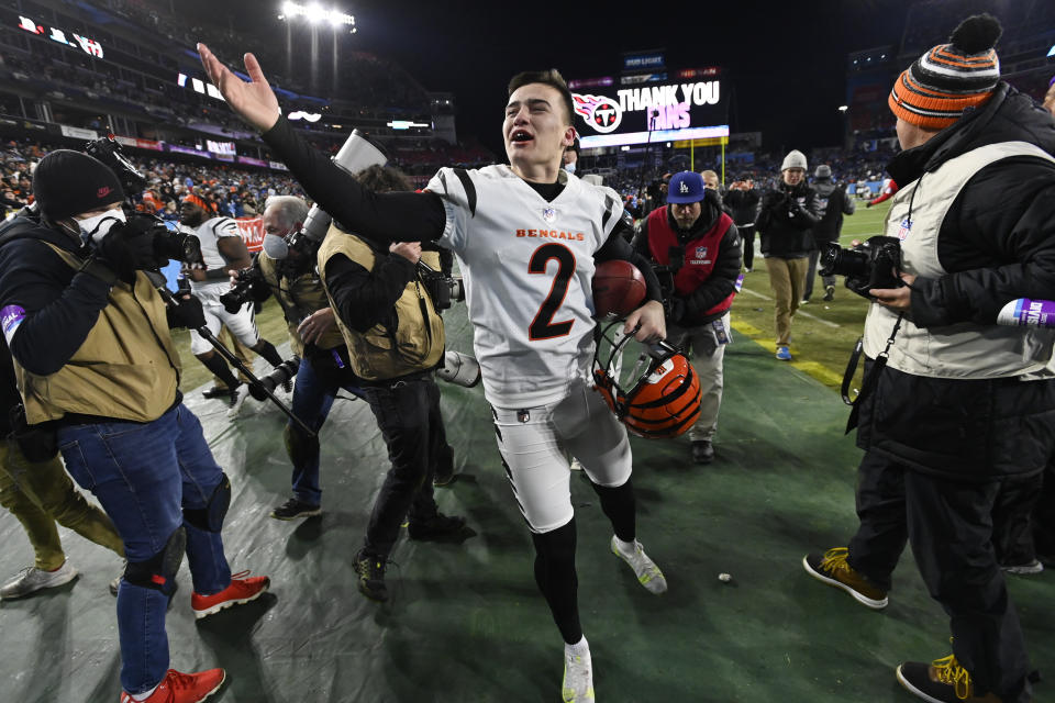 Cincinnati Bengals kicker Evan McPherson (2) celebrates his game-winning field goal against the Tennessee Titans after an NFL divisional round playoff football game, Saturday, Jan. 22, 2022, in Nashville, Tenn. The Cincinnati Bengals won 19-16. (AP Photo/Mark Zaleski)