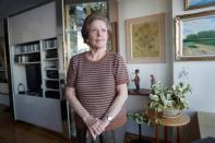 Lea Evron poses at her apartment in the Queens borough of New York