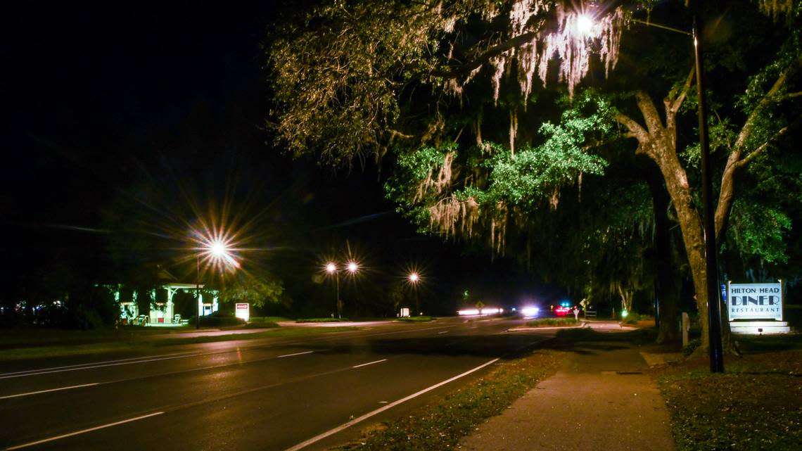 Photographed with a long exposure, the only overhead street lights on U.S. 278 illuminate the pedestrian crosswalk at Yacht Cove Drive on May 1, 2023 on Hilton Head Island. The lights were installed in October 2020 as a pilot project for street lighting after 11-year-old islander Charli Bobinchuck died while crossing U.S. 278 with her dog, Max, in June 2018.