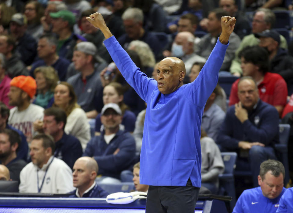 DePaul head coach Tony Stubblefield gestures to his team during the first half of an NCAA college basketball game against Connecticut Saturday, March 5, 2022, in Storrs, Conn. (AP Photo/Stew Milne)