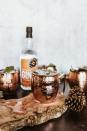 <p> Shake 2 oz. Citrus Forward Gin, 1 oz. lime juice, and 2 dashes cranberry bitters with ice. Pour into a mule mug. Top with4 oz. ginger beer. Garnish with a cranberry skewer and mint leaves</p><p><em>Recipe from <a href="https://blackbuttondistilling.com/citrus-forward-gin" rel="nofollow noopener" target="_blank" data-ylk="slk:Citrus Forward Gin" class="link rapid-noclick-resp">Citrus Forward Gin</a></em></p>