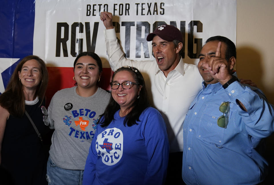 Texas Democratic gubernatorial candidate Beto O'Rourke, second from right, poses with supporters during a campaign stop, Friday, Sept. 30, 2022, in Edinburg, Texas. As Democrats embark on another October blitz in pursuit of flipping America's biggest red state, Republicans are taking a swing of their own: Making a play for the mostly Hispanic southern border on Nov. 8 after years of writing off the region that is overwhelmingly controlled by Democrats. (AP Photo/Eric Gay)