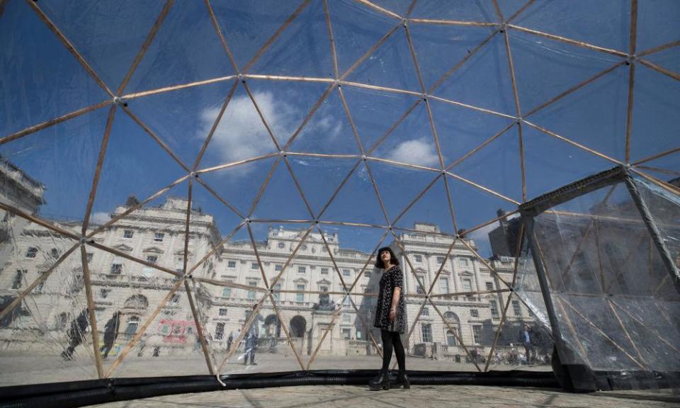 A visitor inside one of Michael Pinsky’s Pollution Pods.