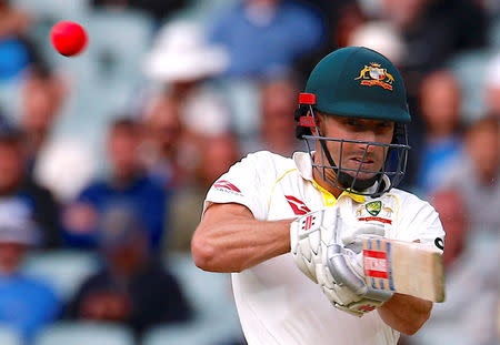 Cricket - Ashes test match - Australia v England - Adelaide Oval, Adelaide, Australia, December 3, 2017 - Australia's Shaun Marsh hits a boundary to reach his century during the second day of the second Ashes cricket test match. REUTERS/David Gray