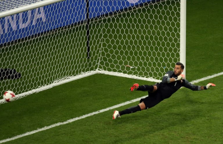 Portugal's goalkeeper Rui Patricio fails to stop a goal by Chile's midfielder Arturo Vidal during the 2017 Confederations Cup semi-final football match June 28, 2017