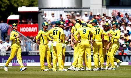 Cricket - England v Australia - Fifth One Day International - Emirates Old Trafford, Manchester, Britain - June 24, 2018 Australia's Billy Stanlake celebrates with teammates after taking the wicket of England's Jonny Bairstow Action Images via Reuters/Craig Brough
