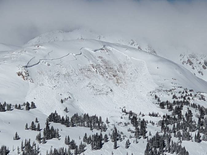 This image provided by Colorado Avalanche Information Center shows an avalanche that killed an unidentified snowboarder near the town of Winter Park in Colorado, in this Sunday, Feb. 14, 2021, file photo. This has been an highly dangerous avalanche season, with 30 confirmed fatalities. It's involved different recreational activities — snowboarding, skiing, snowmobiling, hiking — and includes various ages and experience levels. A warning from avalanche experts for anyone venturing into the backcountry: The threat of slides may only be growing worse. (Colorado Avalanche Information Center via AP, File)