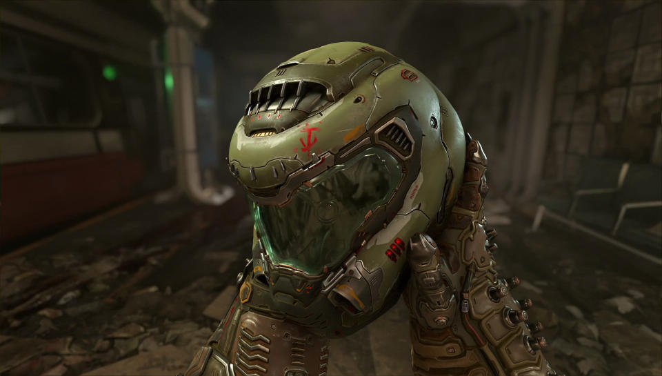 Doomguy holding his helmet.