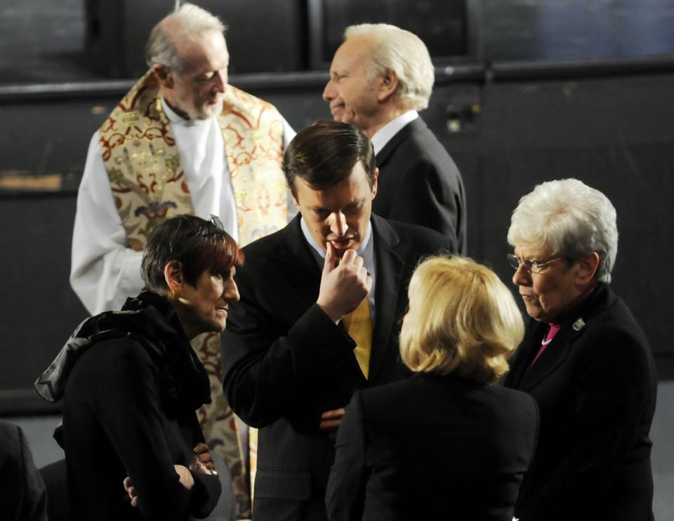 NEWTOWN, CT - DECEMBER 16: Hundreds of local residents wait for the arrival of U.S. President Obama including Sen. Joseph Lieberman (Top Center), Rep. Rosa DeLauro (L), Sen-elect Chris Murphy (C) and Lt. Gov. Nancy Wyman (R) on December 16, 2012 at Newtown High School in Newtown, Connecticut. Twenty-six people were shot dead, including twenty children, after a gunman identified as Adam Lanza opened fire at Sandy Hook Elementary School. Lanza also reportedly had committed suicide at the scene. A 28th person, believed to be Nancy Lanza, found dead in a house in town, was also believed to have been shot by Adam Lanza. (Photo by Stephen Dunn-Pool/Getty Images)