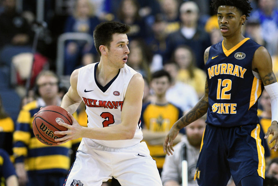 Belmont Bruins guard Grayson Murphy (2) holds the ball away from Murray State Racers Guard Ja Morant (12) during the Ohio Valley Conference (OVC) Championship college basketball game on March 9. (Getty)