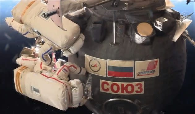 Cutting into Soyuz cover