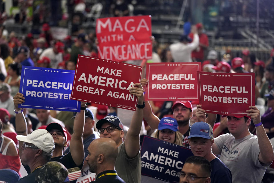 Supporters wait for President Donald Trump to speak at a rally at Xtreme Manufacturing, Sunday, Sept. 13, 2020, in Henderson, Nev. (AP Photo/Andrew Harnik)