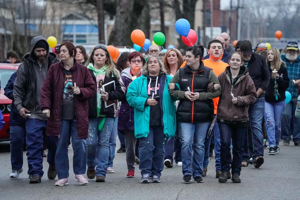 The family and friends of missing Scottie Dean Morris lead a candlelight vigil and march from Grace and Mercy Full Gospel Church to a nearby park where a cross was erected on Thursday, March 23, 2023, in Eaton Indiana. Morris,14, left his family's home in Eaton about 8:30 p.m. Thursday, March 16, 2023, and has not been seen since.