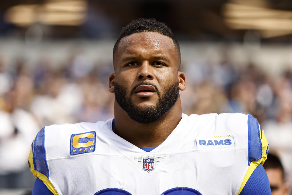 INGLEWOOD, CALIFORNIA - OCTOBER 09: Aaron Donald #99 of the Los Angeles Rams looks on during the national anthem prior to an NFL football game against the Dallas Cowboys at SoFi Stadium on October 09, 2022 in Inglewood, California. (Photo by Michael Owens/Getty Images)