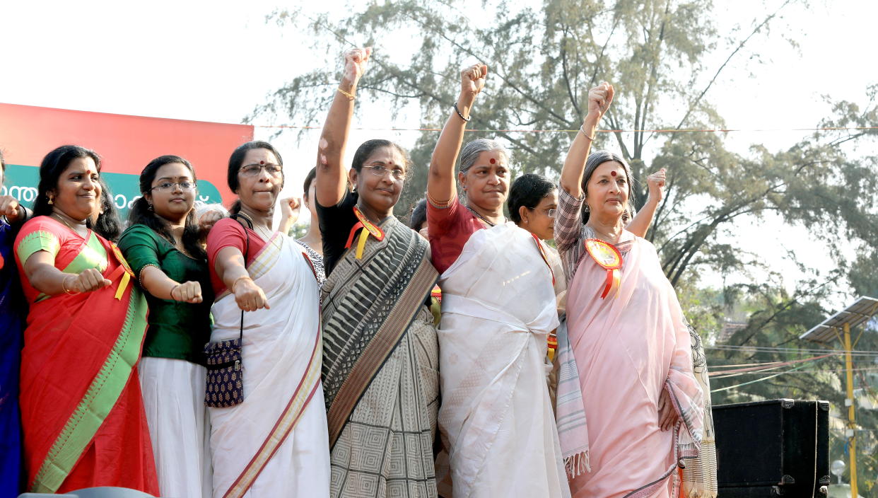 KERALA, INDIA – JANUARY 01: Women take oath as they gather to participate in the 620 km-long ‘Women’s Wall’ against communalism and gender discrimination, Thiruvananthapuram, on January 1, 2019 in Kerala, India. (Photo by Vivek R Nair/Hindustan Times via Getty Images)