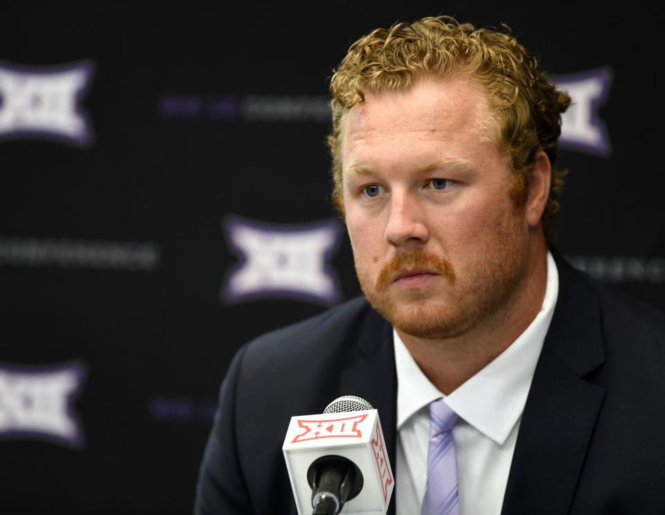 Kansas State's Eli Huggins speaks during the first day of the Big 12 football media days Wednesday at AT&T Stadium in Arlington, Texas.