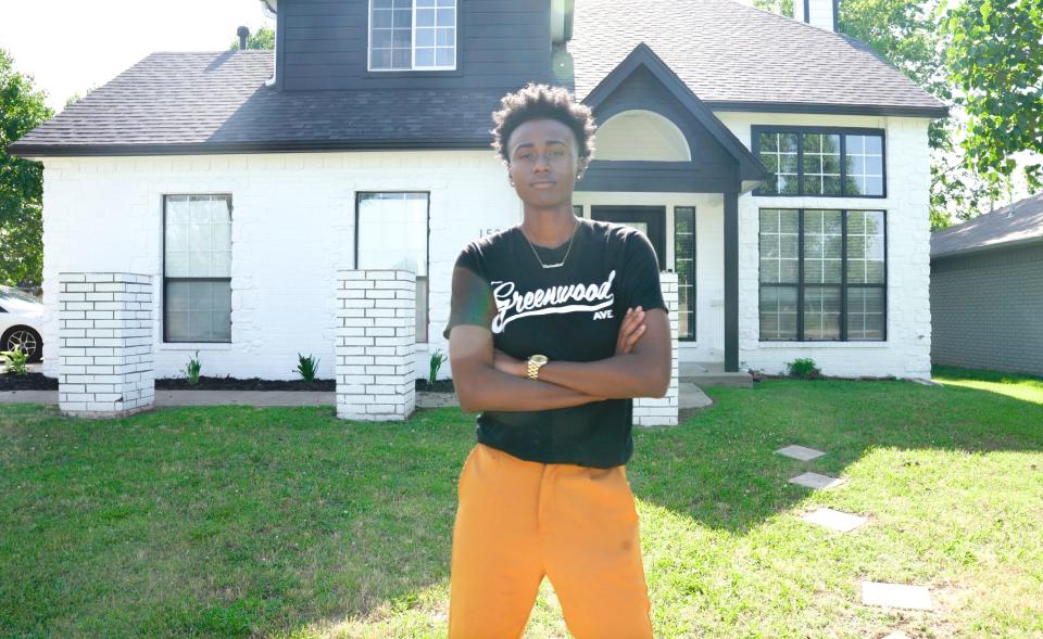 Kelsey Davis in front of her new home in Tulsa, Okla.