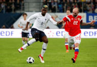 Soccer Football - International Friendly - Russia vs France - Saint-Petersburg Stadium, Saint Petersburg, Russia - March 27, 2018 France’s Paul Pogba in action with Russia’s Konstantin Rausch REUTERS/Grigory Dukor