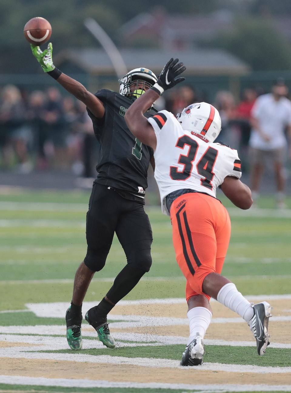 Massillon linebacker Dorian Pringle pressures the quarterback at GlenOak, Friday, Aug. 26, 2022.