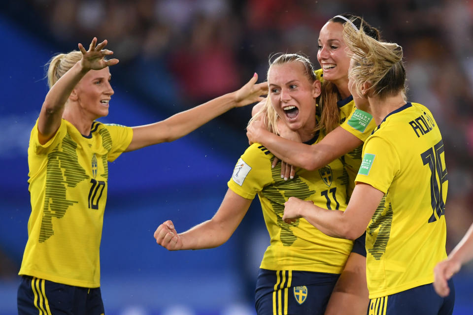 PARIS, FRANCE - JUNE 24: Stina Blackstenius of Sweden celebrates with teammate Kosovare Asllani after scoring her team's first goal during the 2019 FIFA Women's World Cup France Round Of 16 match between Sweden and Canada at Parc des Princes on June 24, 2019 in Paris, France. (Photo by Laurence Griffiths/Getty Images)