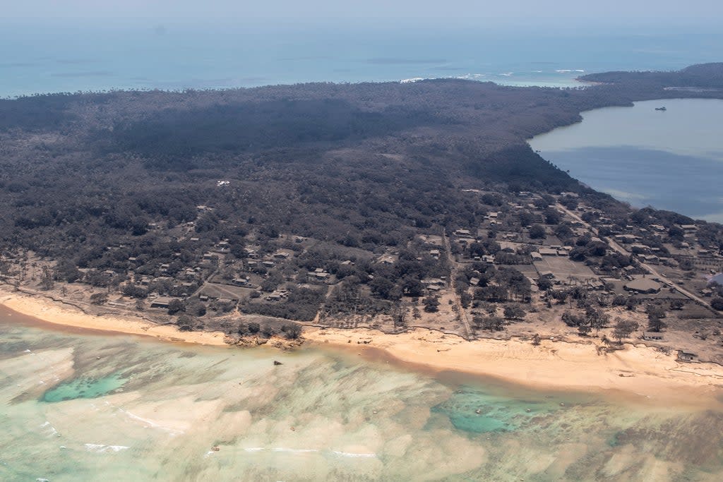 Nomuka in Tonga covered in ash after the Pacific island nation was hit by a tsunami (Reuters)