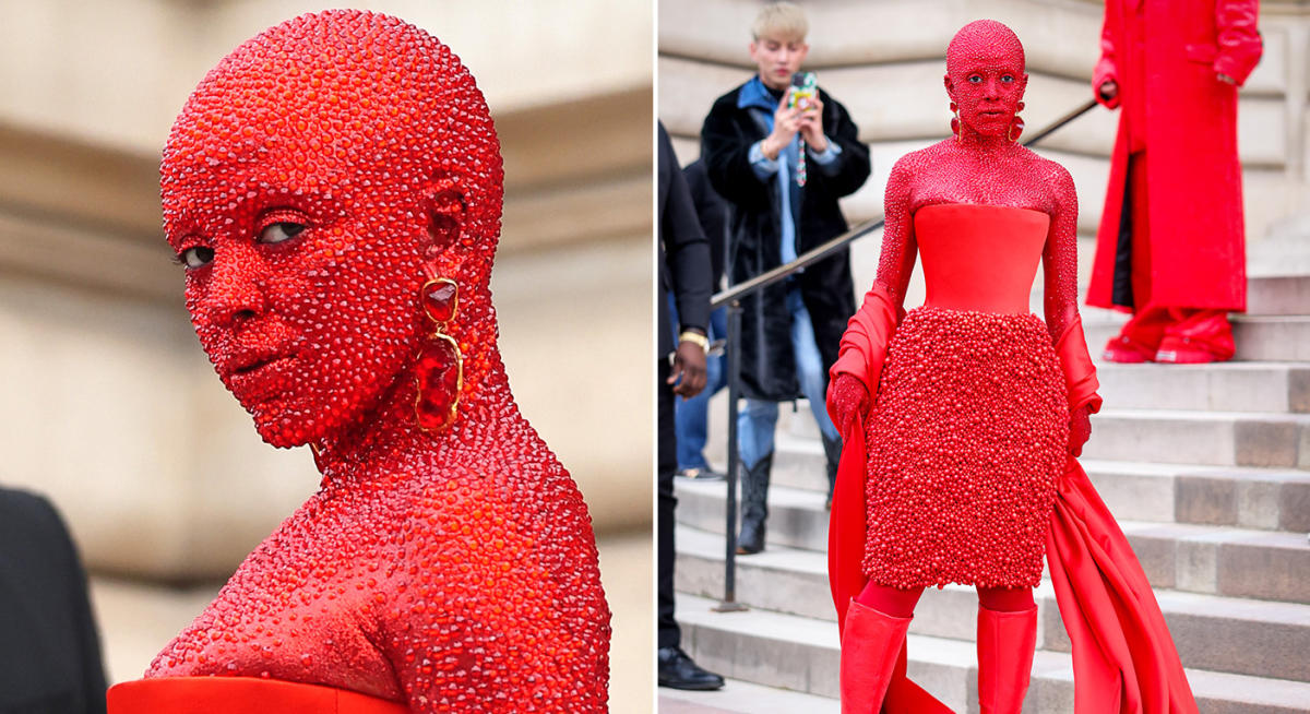 Doja Cat is bodypainted in red with 30,000 Swarovski crystals for