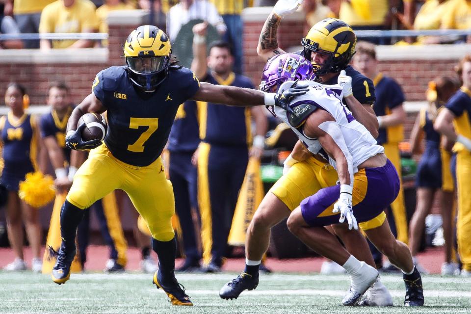 Michigan running back Donovan Edwards (7) runs against East Carolina during the first half at Michigan Stadium in Ann Arbor on Saturday, Sept. 2, 2023.