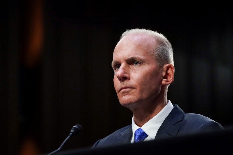 FILE PHOTO: Boeing Chief Executive Dennis Muilenburg testifies before a Senate Commerce, Science and Transportation Committee hearing on “aviation safety” and the grounded 737 MAX after two deadly 737 MAX crashes killed 346 people, on Capitol Hill in Washington, U.S., October 29, 2019. REUTERS/Sarah Silbiger